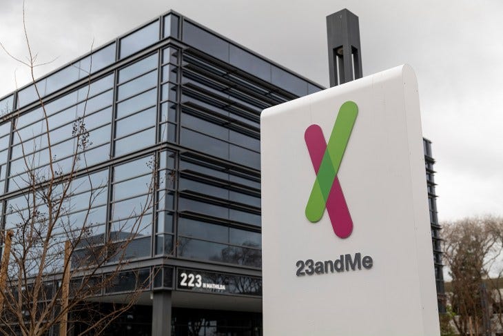 a sign outside 23andMe's office in California, featuring the company's office in the background