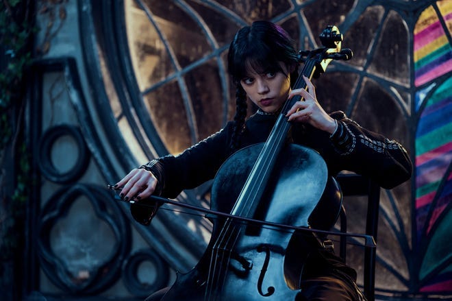 Jenna Ortega learned how to play cello, Wednesday Addams' musical instrument of choice, for "Wednesday."