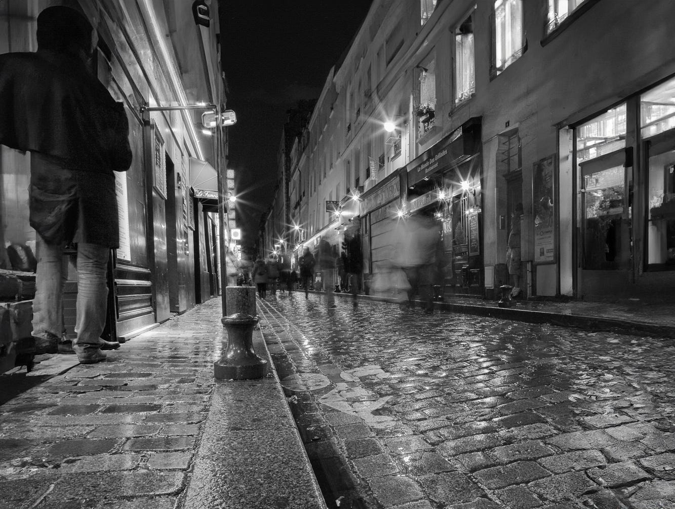 Wet cobblestone street.