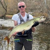 May be an image of 1 person, fishing and Pickerel