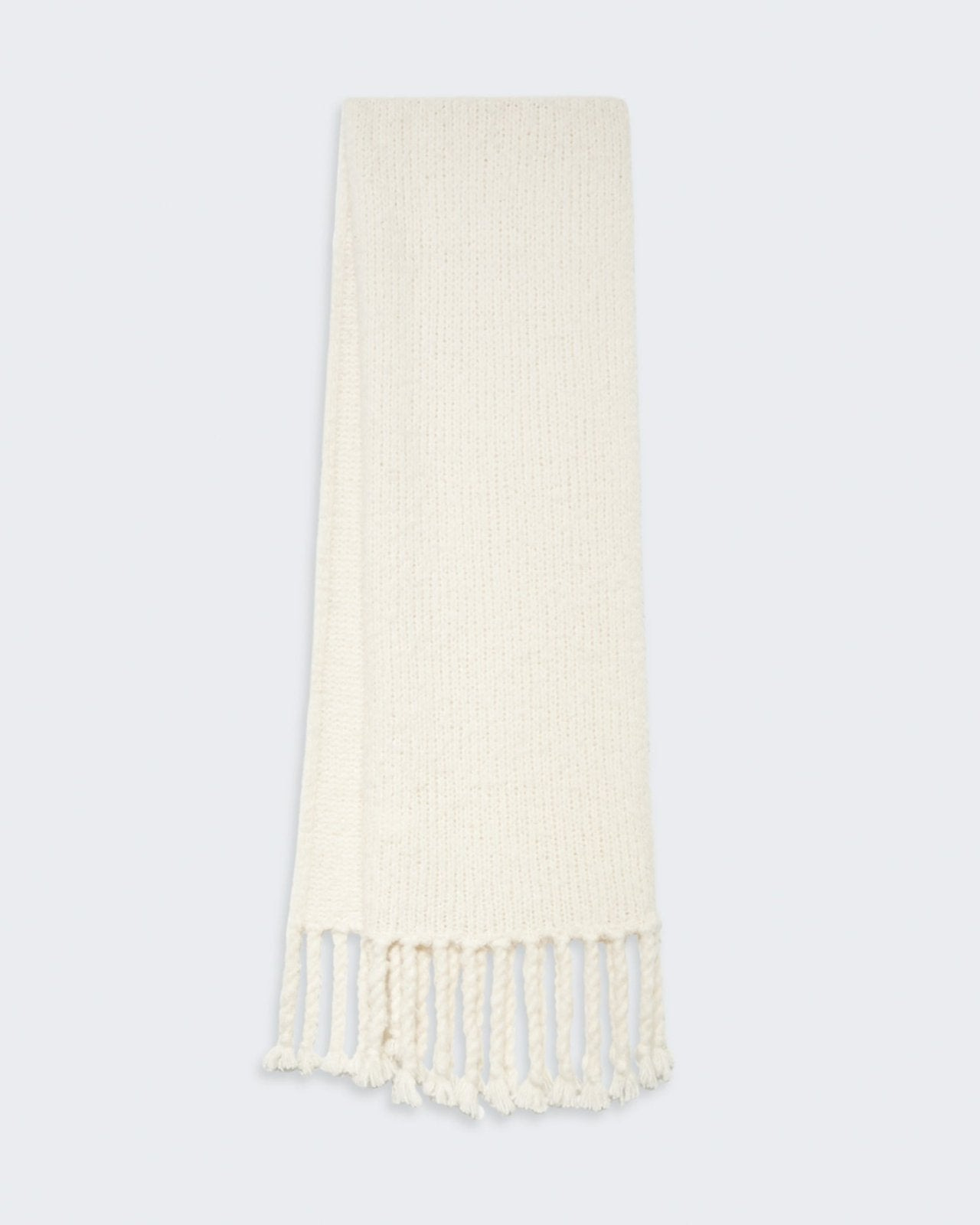 Cream-colored knit scarf with tassels