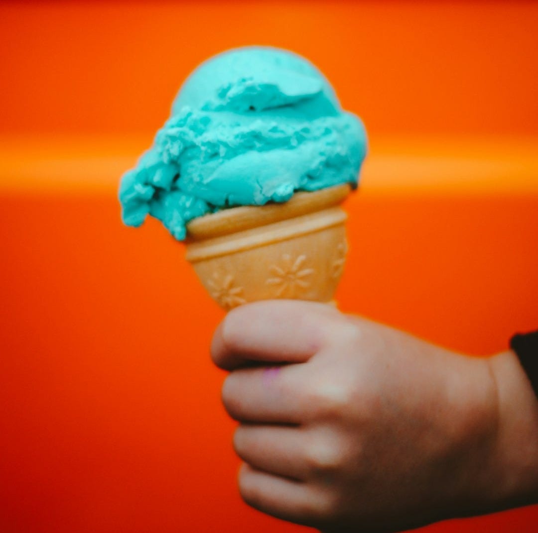 person holding ice cream