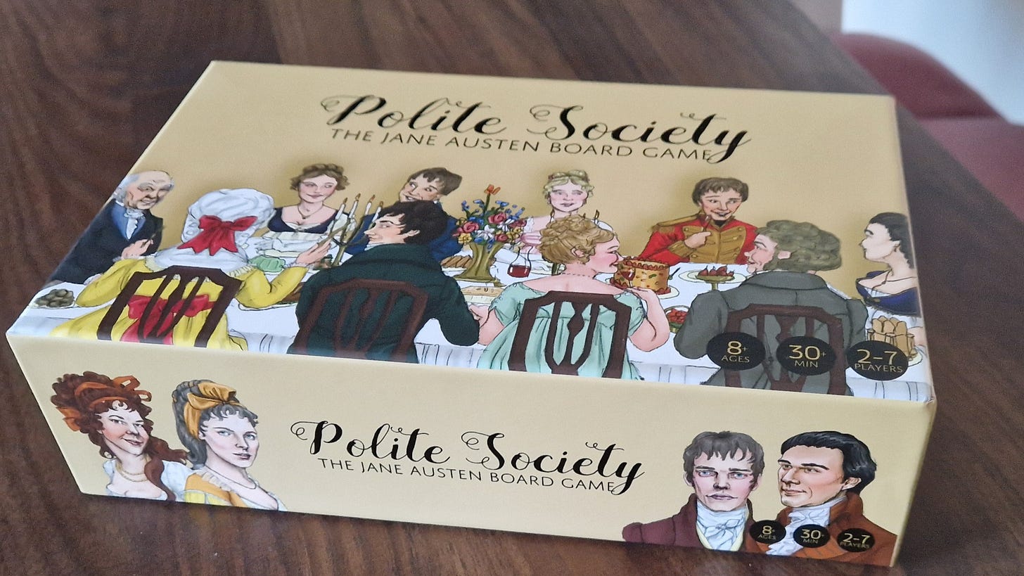 Polite Society: The Jane Austen Board Game box on a dark wood table. Pale yellow box with illustrations of people at a regency dining table