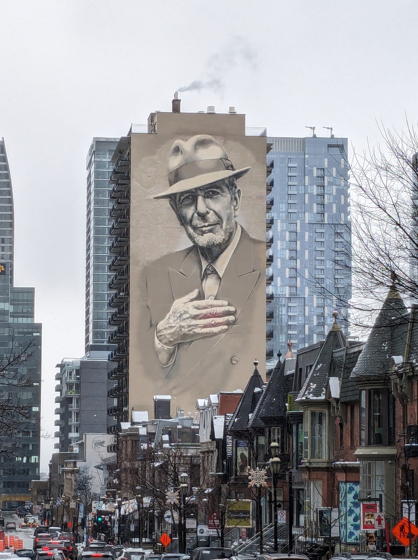 Leonard Cohen image on side of a building