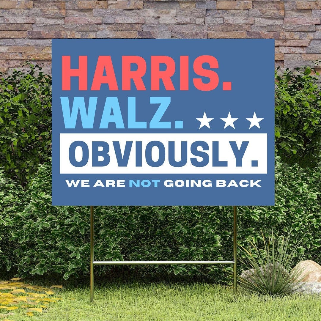 Blue yard sign with HARRIS in red capitals, WALK in light blue capitals, and OBVIOUSLY in medium blue on white background. A line in smaller capitals reads WE ARE NOT GOING BACK, with "not" underlined