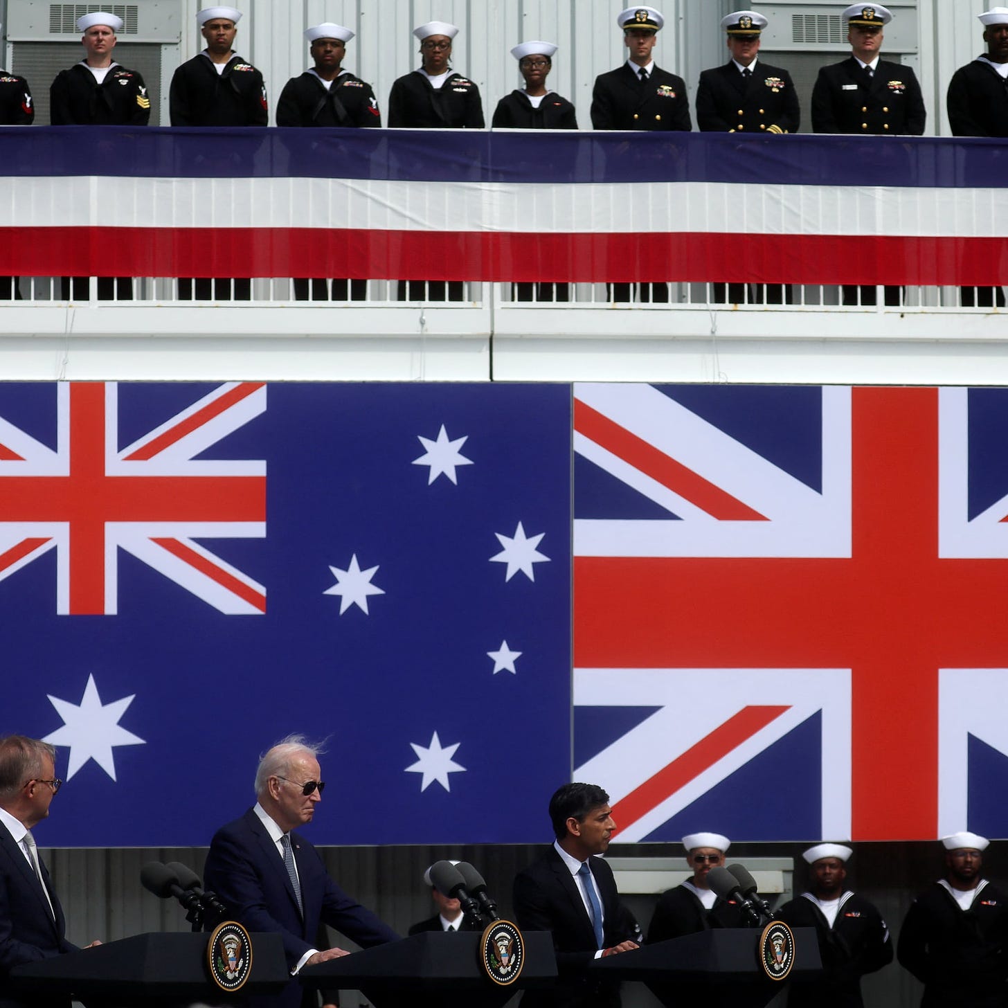 US, Britain, Australia weigh expanding AUKUS security pact to deter China,  FT says | Reuters