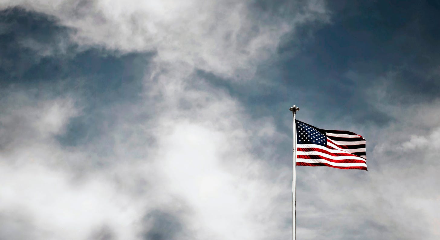 Waving USA flag under grey sky photo – Free Flag Image on Unsplash