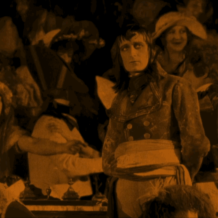Animated gif - Napoleon, on the platform in the National Convention in 1795, still against the excited crowd behind him, from Abel Gance’s 1927 film Napoleon