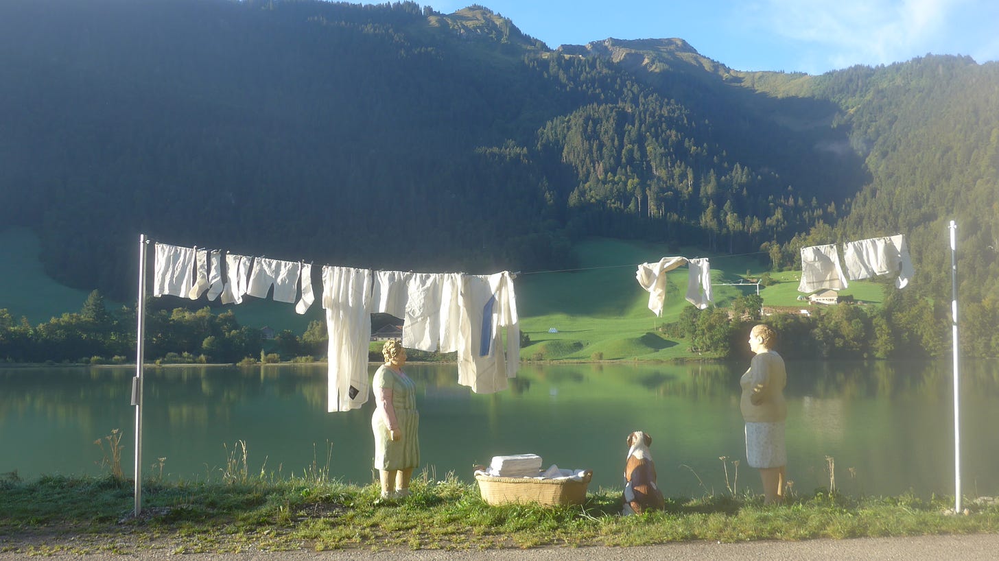 Sculpture by Christel & Laura Lechner shows a laundry line, two women and a dog in the middle