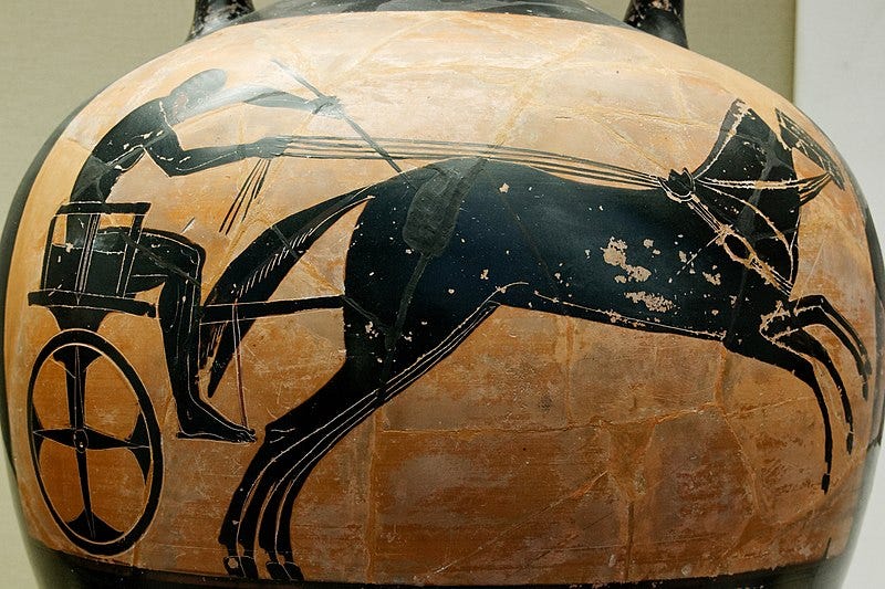 Bearded charioteer driving a mule-cart. Side A of an Attic black-figured Panathenaic prize amphora.