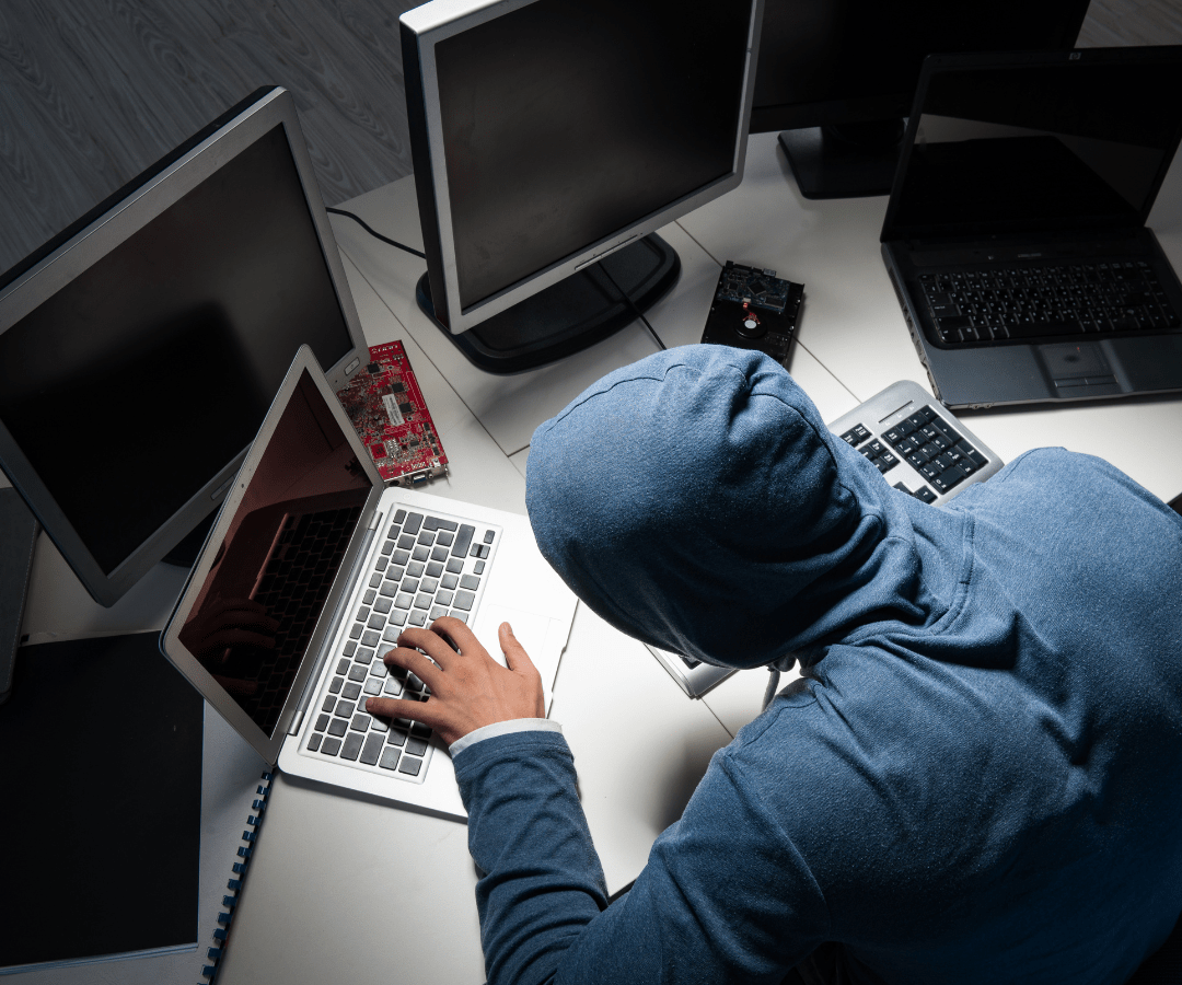 Hacker in disguise while working on multiple screens