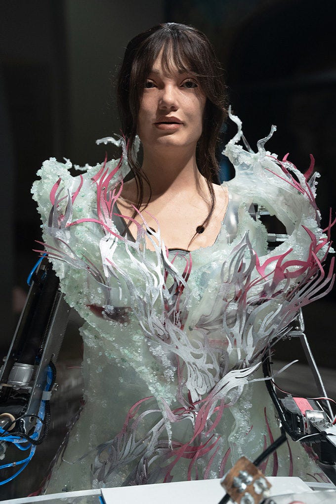 Watch a gown grow and fall apart with the Auroboros Biomimicry collection