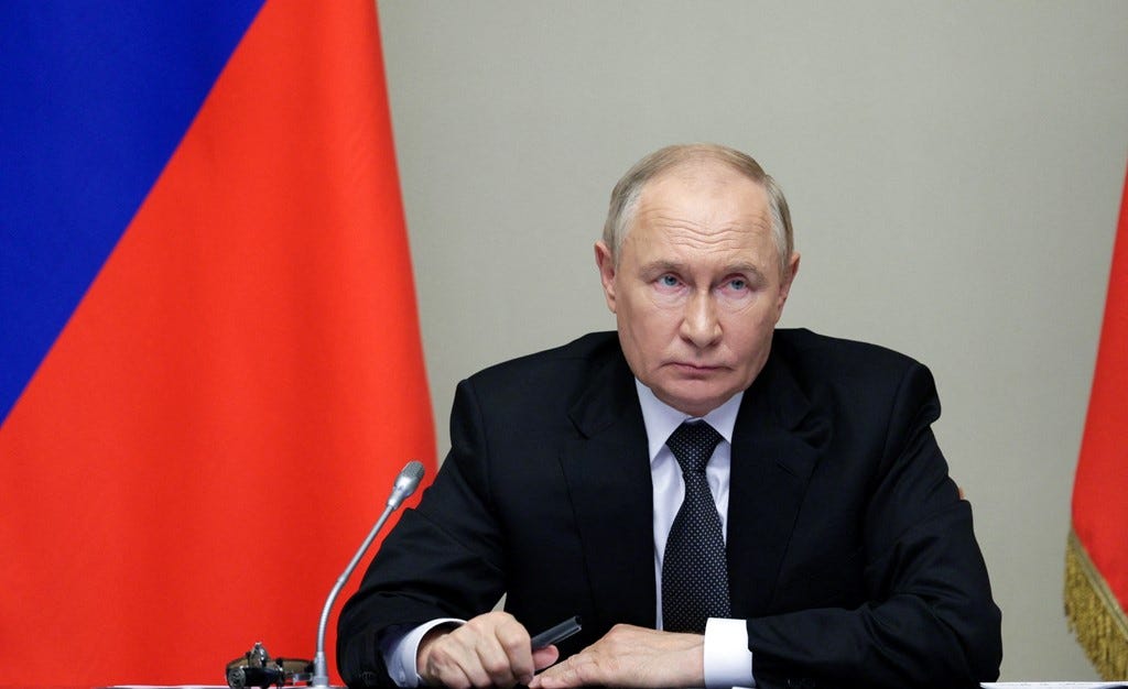 Vladimir Putin at a meeting with security officials