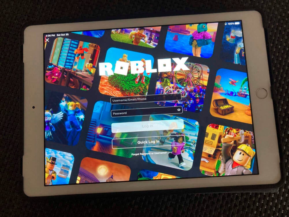 FILE - The gaming platform Roblox is displayed on a tablet, Oct. 30, 2021, in New York.  (Leon Keith/AP)