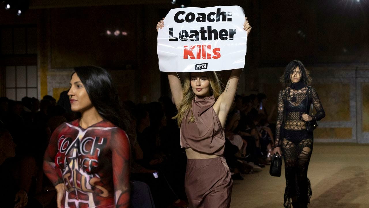 01 coach peta protest 090723