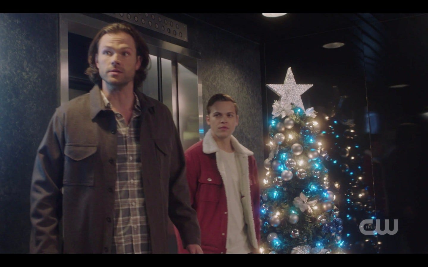 sam winchester with jack by christmas tree spn 1409 spear