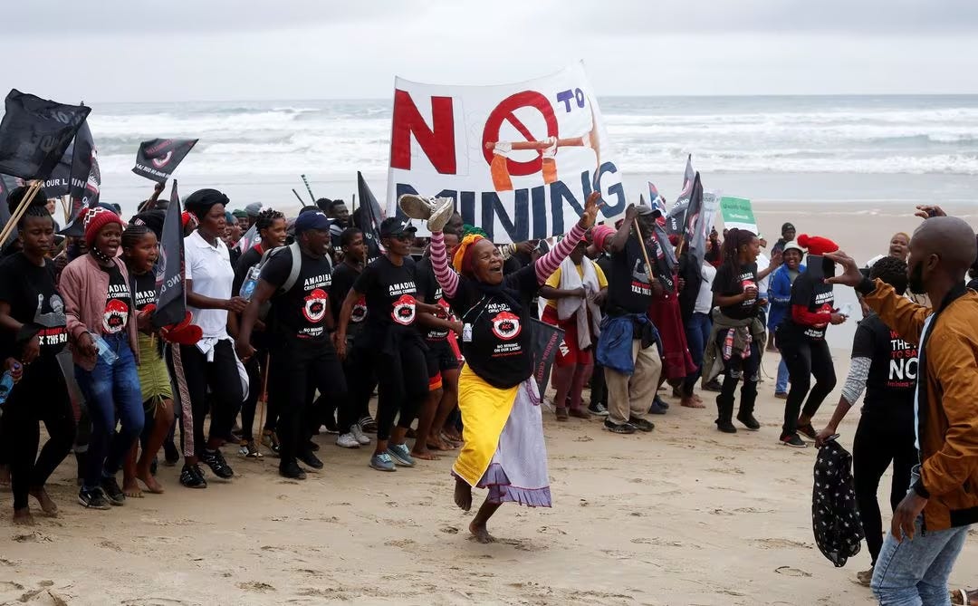 Wild Coast residents demonstrate against Royal Dutch Shell's plans to start seismic surveys to explore petroleum systems off the country's popular Wild Coast at Mzamba Beach, Sigidi, South Africa