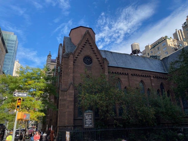 The Calvary Episcopal Church on 21st and Park with a blue sky above.