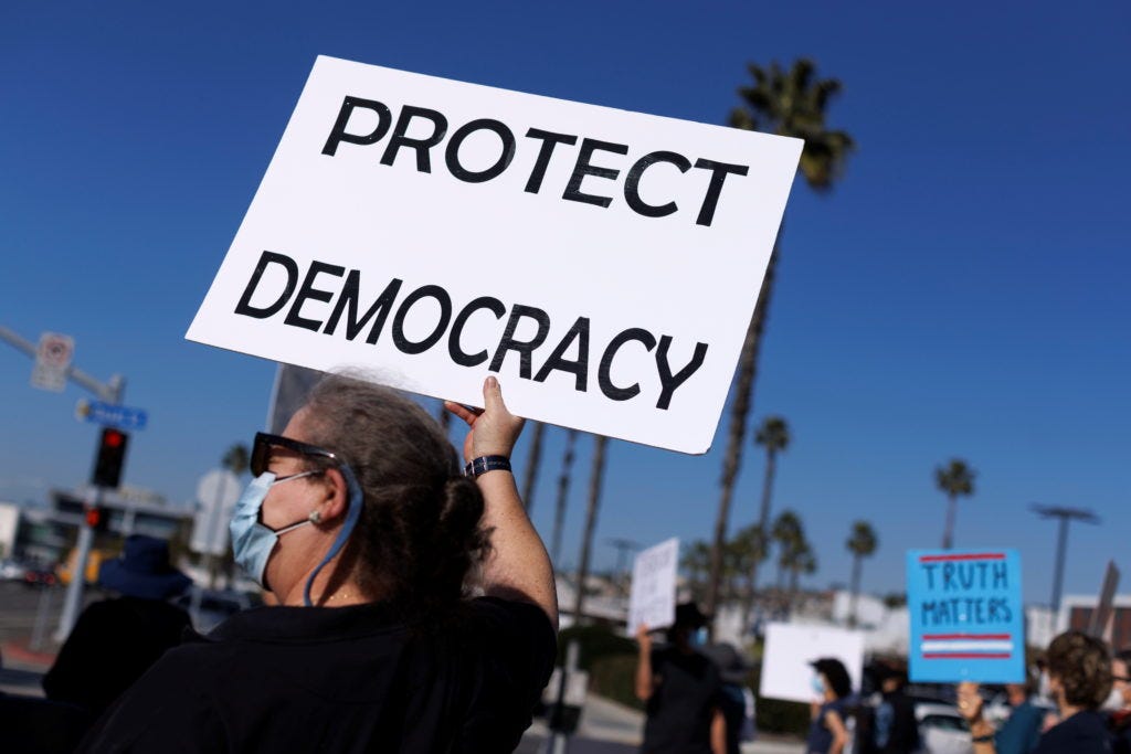 Americans are widely pessimistic about the state of democracy in the U.S.,  AP-NORC poll finds | PBS NewsHour