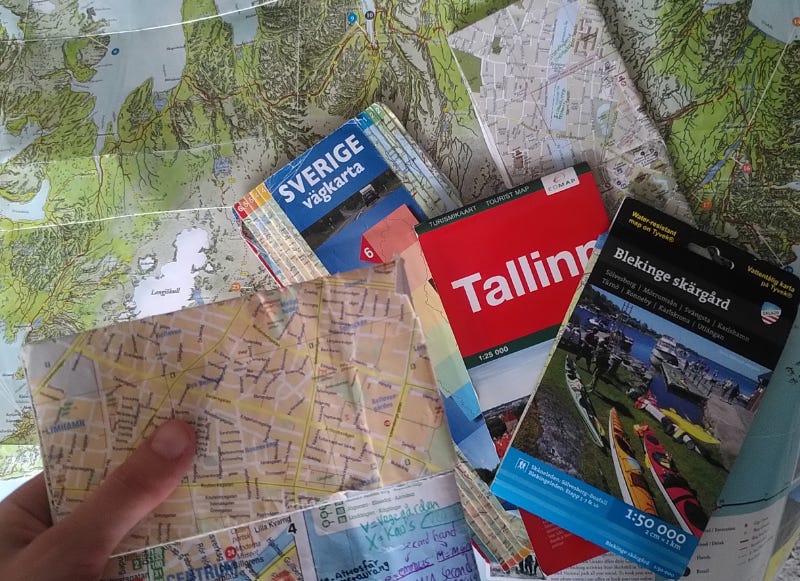 A photograph showing different maps