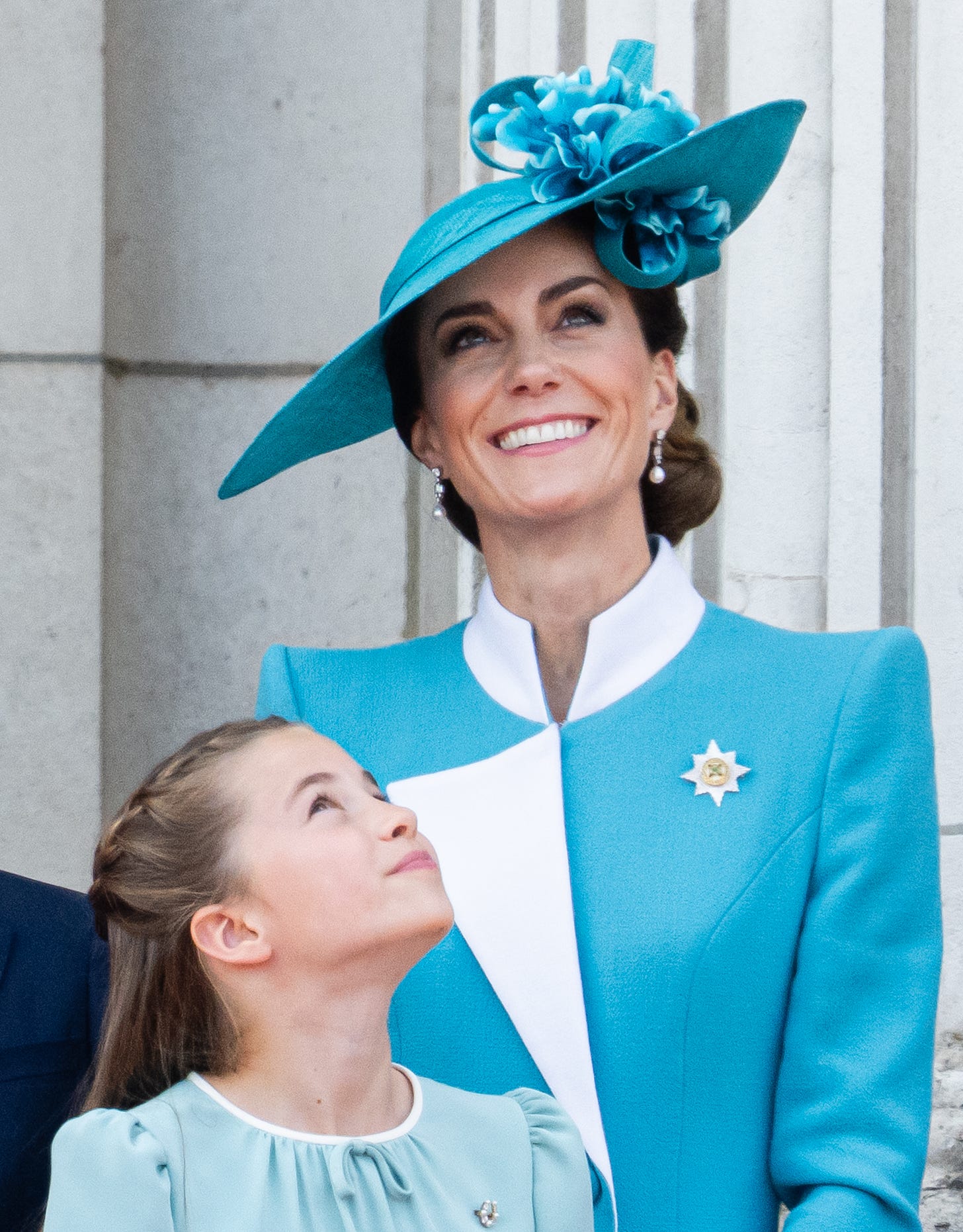 Princess of Wales smiling and looking up on balcony