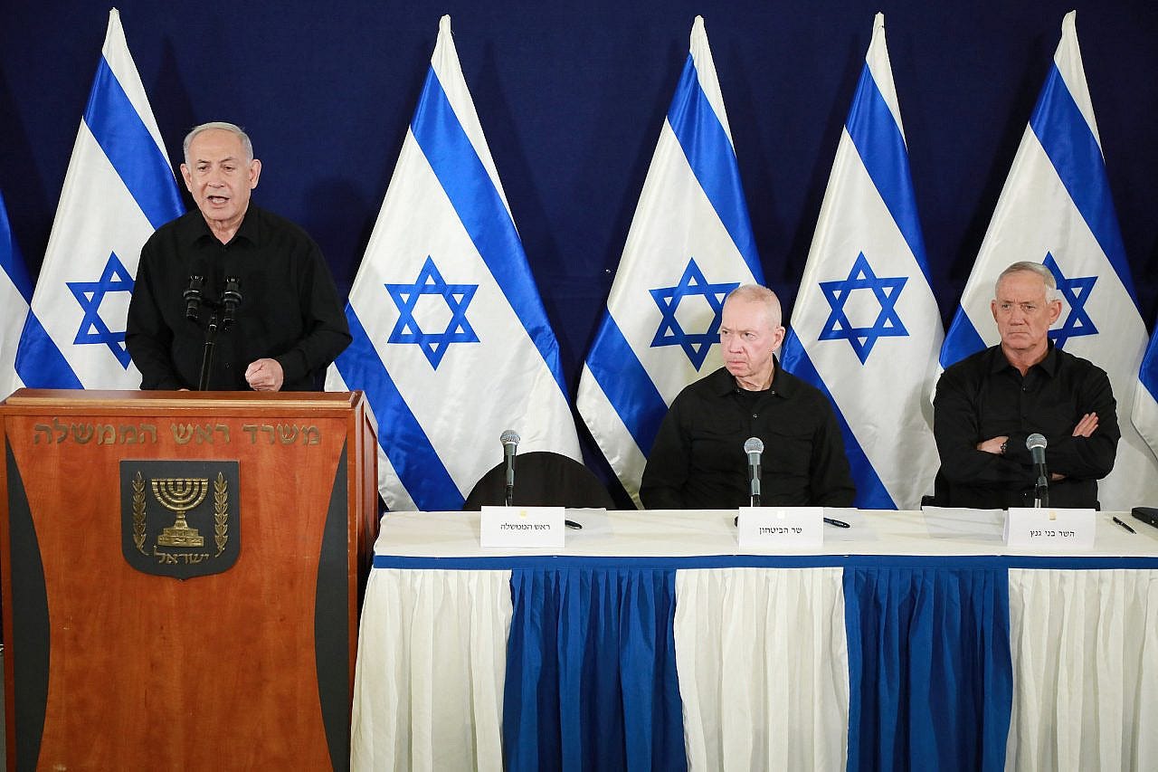 Israeli Prime Minister Benjamin Netanyahu, Defense Minister Yoav Gallant, and Minister without Portfolio Benny Gantz hold a joint press conference at the Defense Ministry, Tel Aviv, November 11, 2023. (Marc Israel Sellem/POOL)