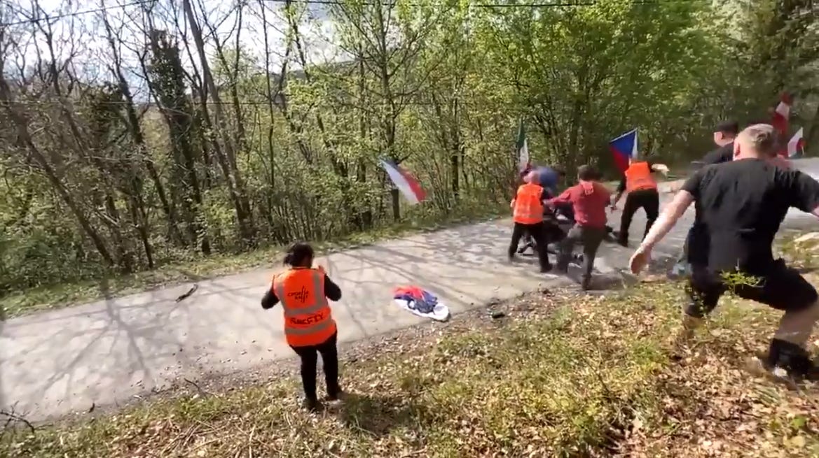 The fight escalated quickly, with two spectators lying in the middle of the rally course