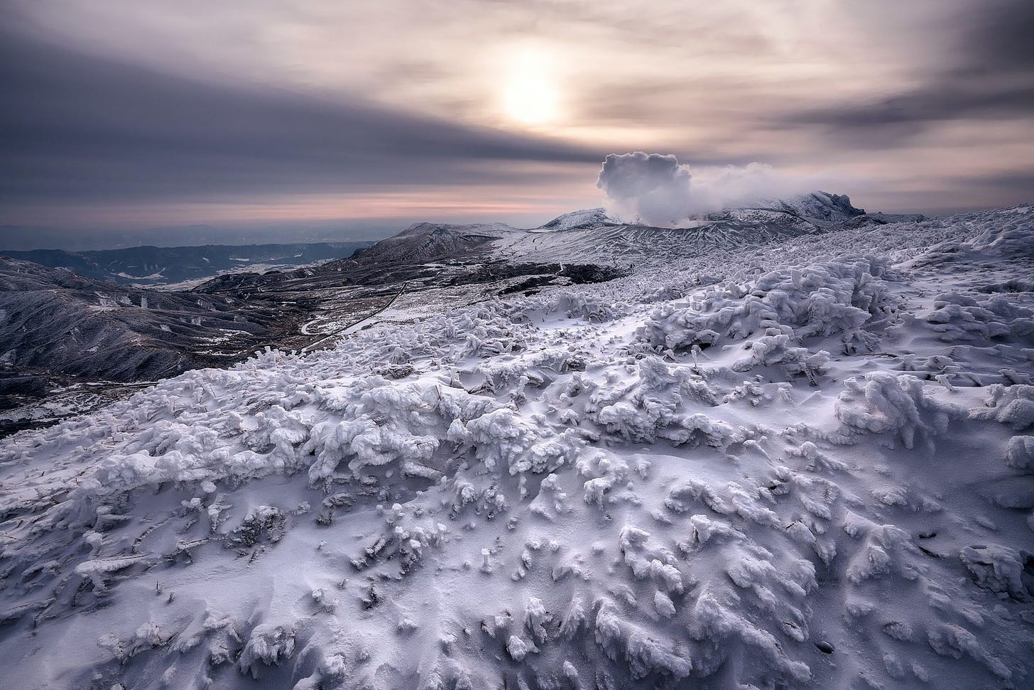 Photo of snowy terrain near the sea by Sami Anas from Pexels