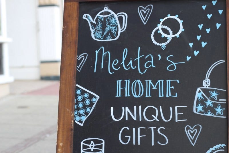 Melitas Gifts Sign