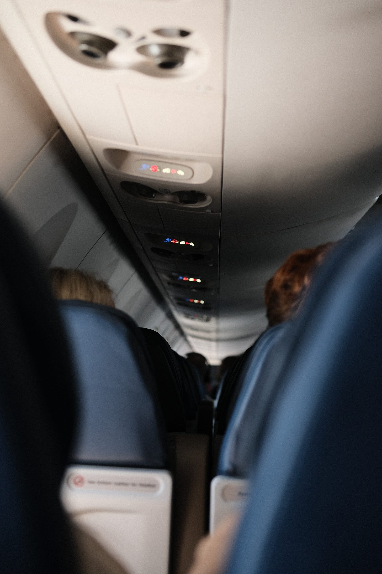 Solo travel stories airport saga flight to australia by food and travel writer Courtney Jill Bishop.