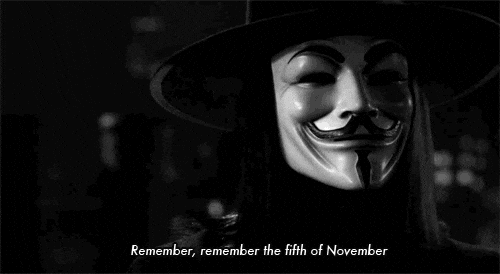 A GIF from the movie "V for Vendetta." The masked character of V turns to the camera. Text on the GIF reads "Remember, remember the fifth of November." At the end of the GIF, additional text appears that reads "CAUSE IT'S ELECTION DAY." 