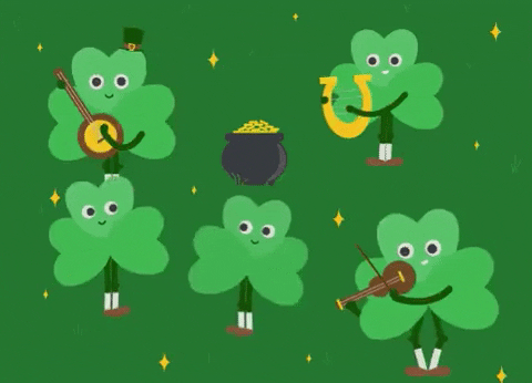 Green shamrocks dance and play instruments on a green field.