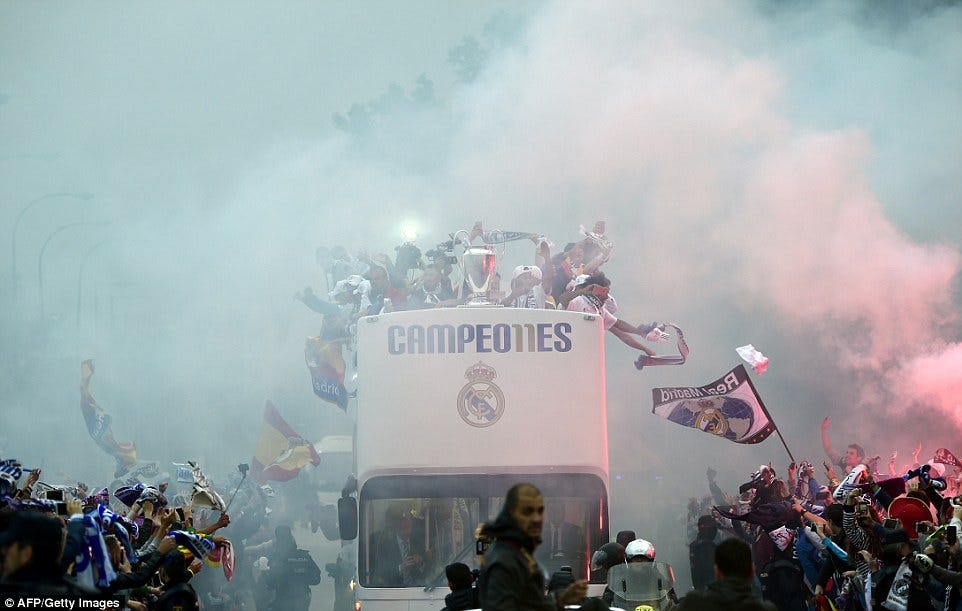 Real Madrid parade European Cup on open-top bus tour after returning home  from Milan as thousands of jubilant fans celebrate Champions League victory  over Atletico Madrid | Daily Mail Online