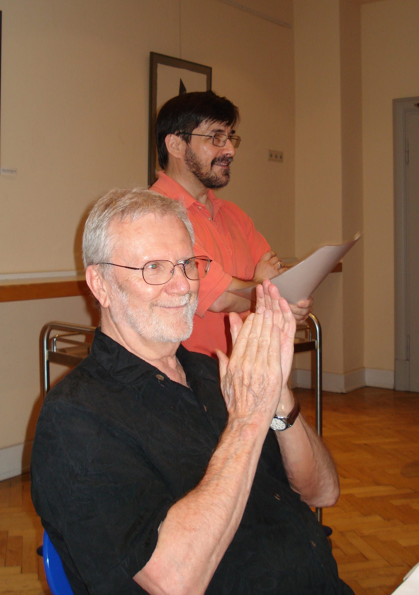 BK reacts with broad approval to a member's presentation, 30 June 2009. Dallman Ross stands behind him