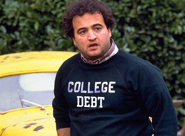 Photo of John Belushi in Animal House, wearing black sweatshirt with 'COLLEGE' printed on the chest. Image clumsily photoshopped to make the shirt say 'COLLEGE DEBT'