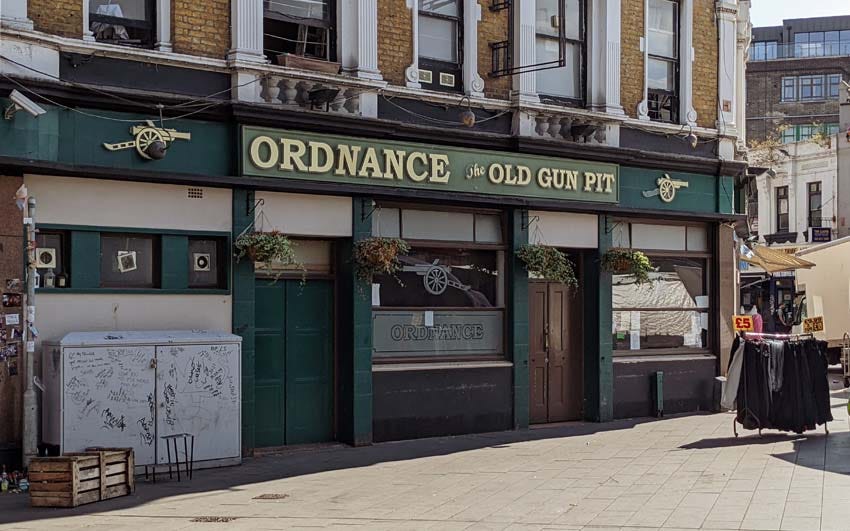 An old Victorian pub on the corner of a market square.