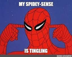 image of spider man pointing to his head and saying "My spider sense is tingling"