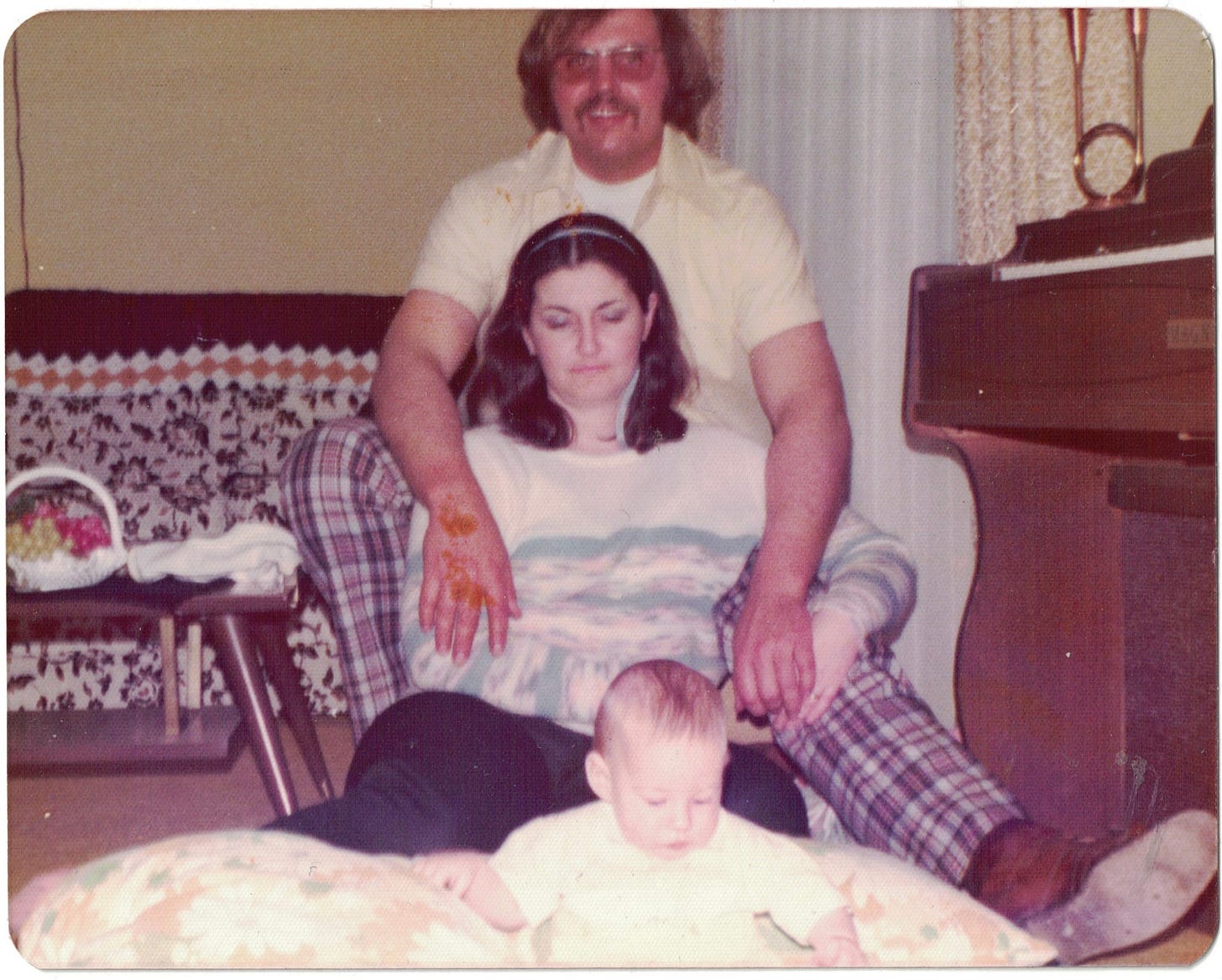 My mother, father, and me at only a few months old.