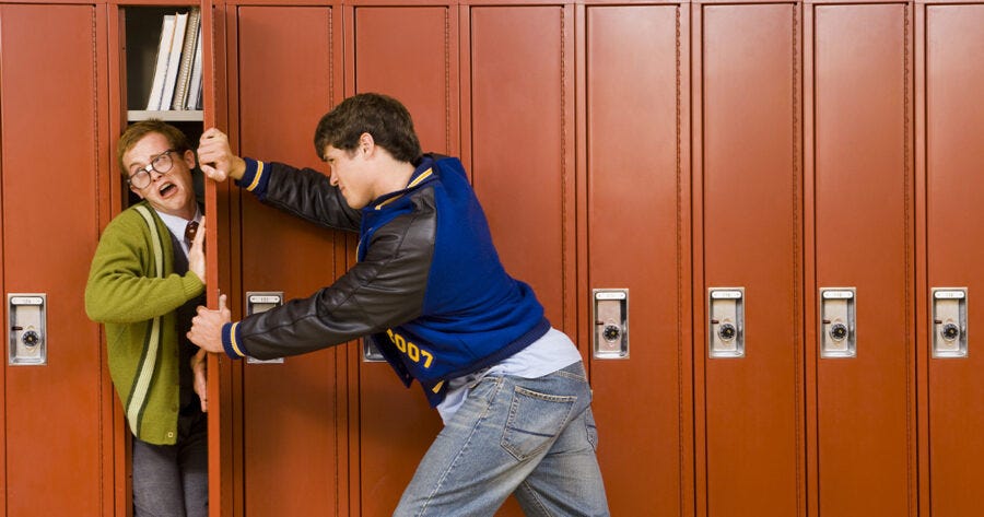 School Budget Cuts Require Bully to Consolidate Nerds Into Single Locker