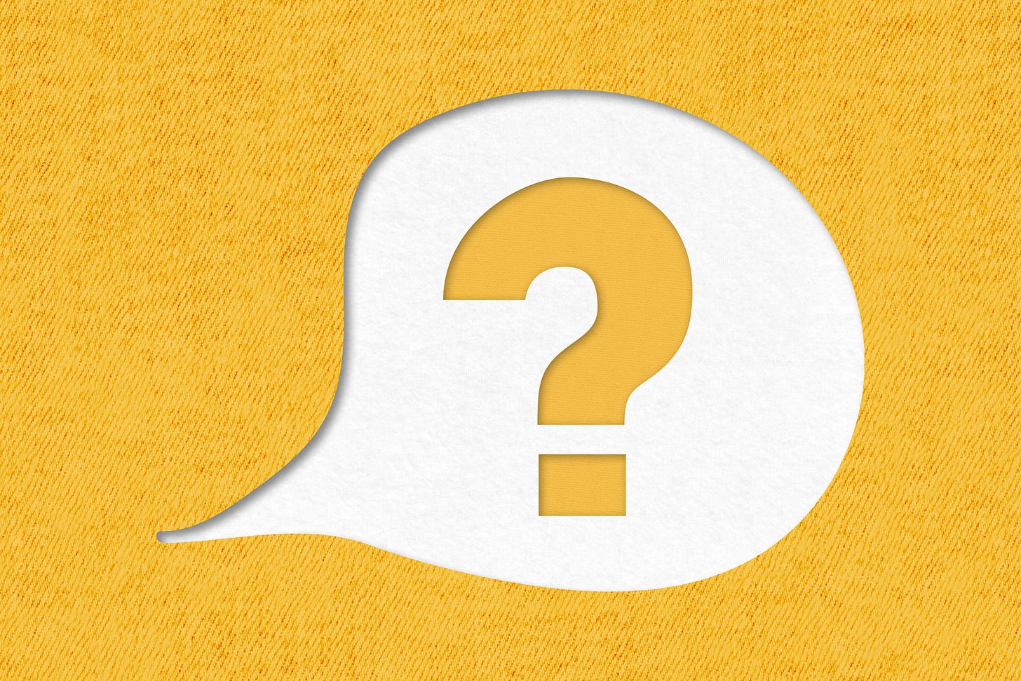 A question mark in a speech bubble on a yellow background.