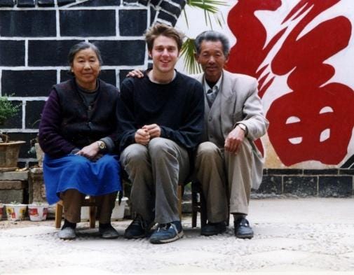 With my host family in Lijiang, China in 2000.