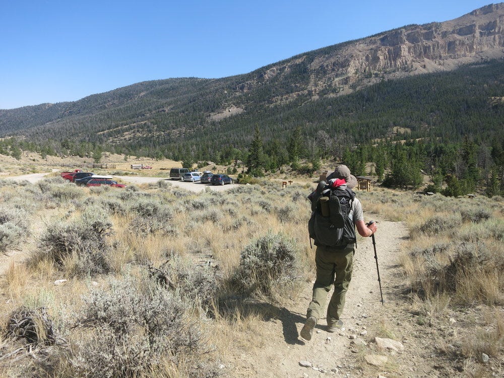 Final few steps to the parking lot.  Note the tiny blue Honda Fit stealing the show. 