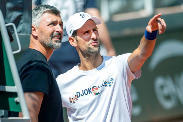 May 19. Novak Djokovic of Serbia with coach Goran Ivanisevic during practice on Court Philippe Chatrier in preparation for the 2022 French Open...