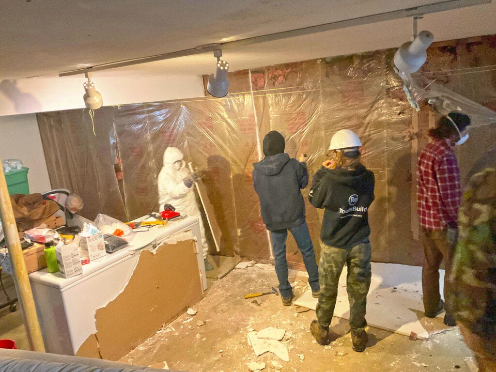 RAFT, Team Rubicon and Resource Youth Build work on a site in Hinesburg.