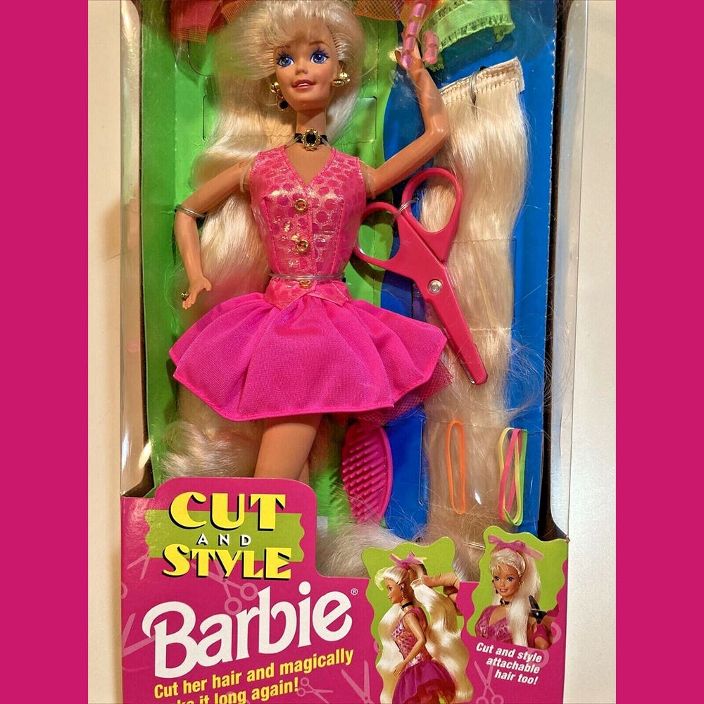 Cut and Style Barbie in her box complete with pink scissors, hair extensions and hair accessories