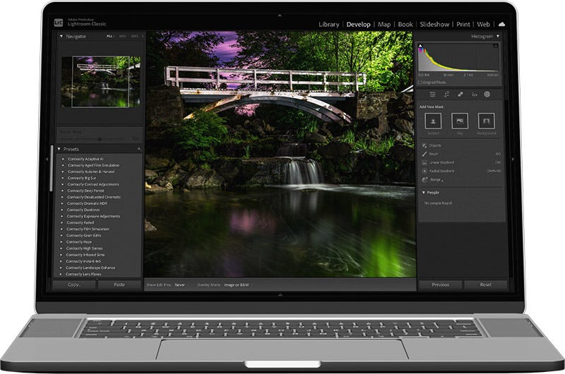 Laptop with Lightroom open for editing a photo