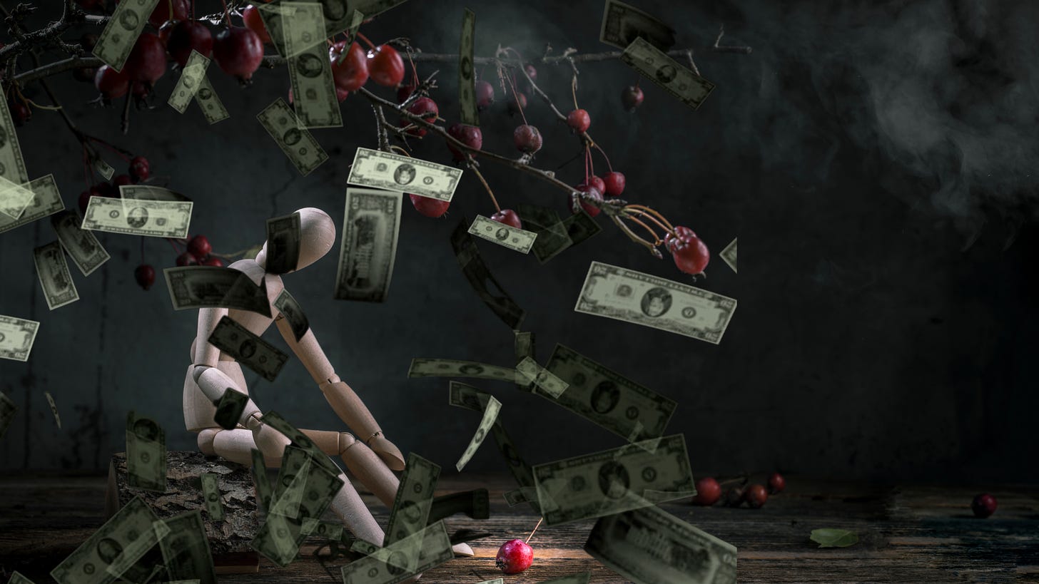 A mannequin sitting beneath an apple tree with falling money and an apple on the ground, which may have fallen from the tree onto the mannequin’s head 