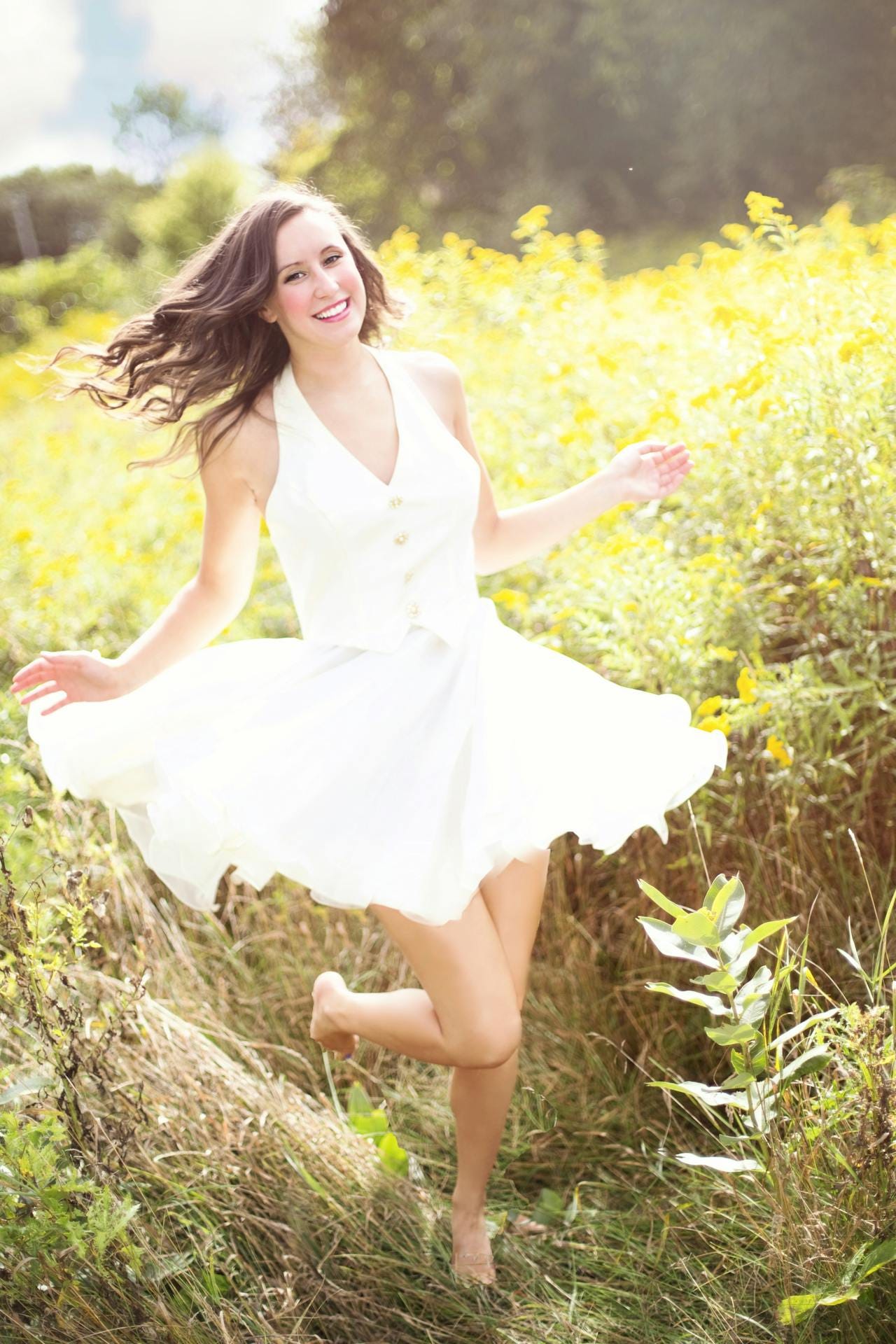 happy girl in sunny field