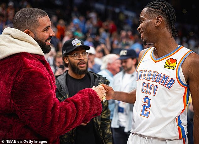 Drake tagged Oklahoma City superstar Gilgeous-Alexander into the post, writing, 'Check that box @shai.' Pictured in December of 2021