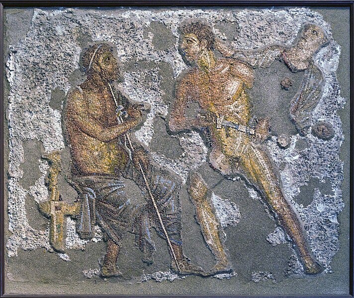 A partly reconstructed moasic of a seated Agamemnon looking up at an Achilles pulling out his sword